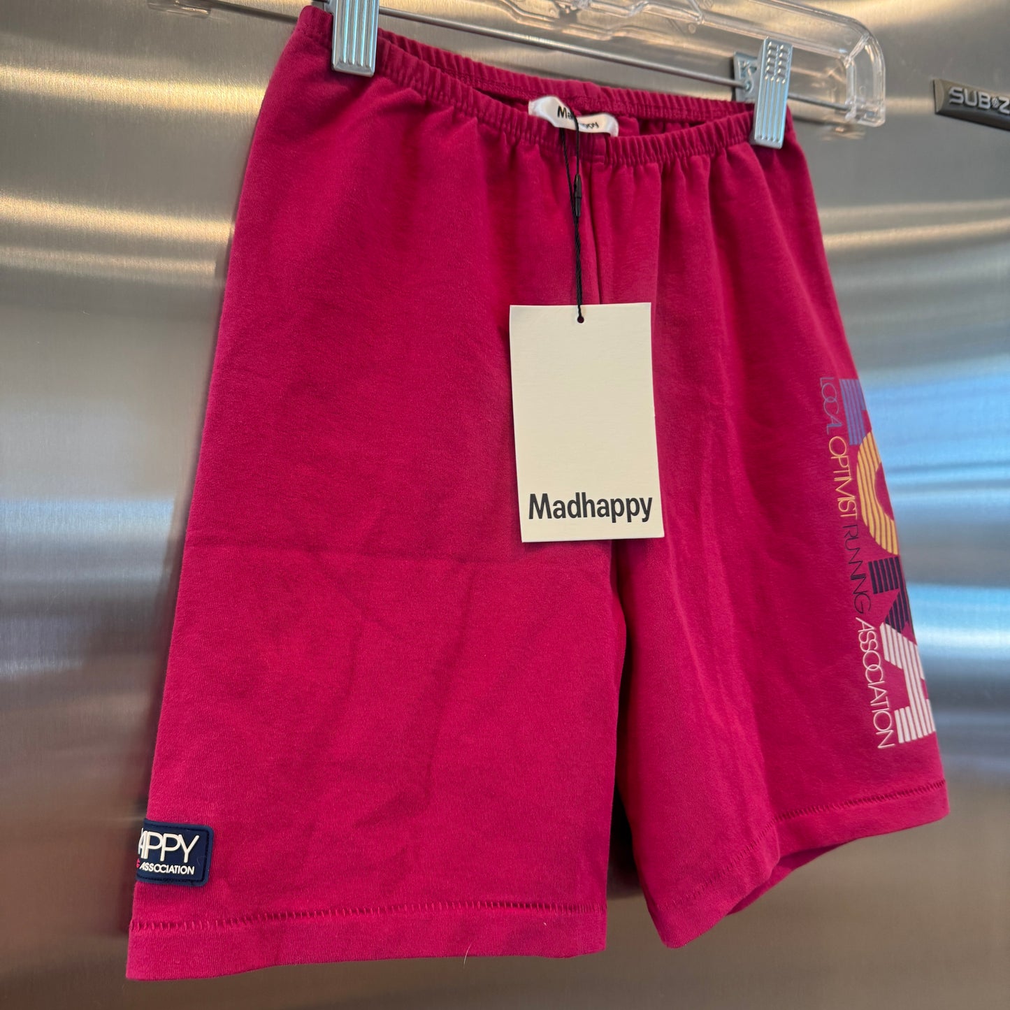 MadHappy Local Optimist Run Club Biker Shorts in Magenta Peony