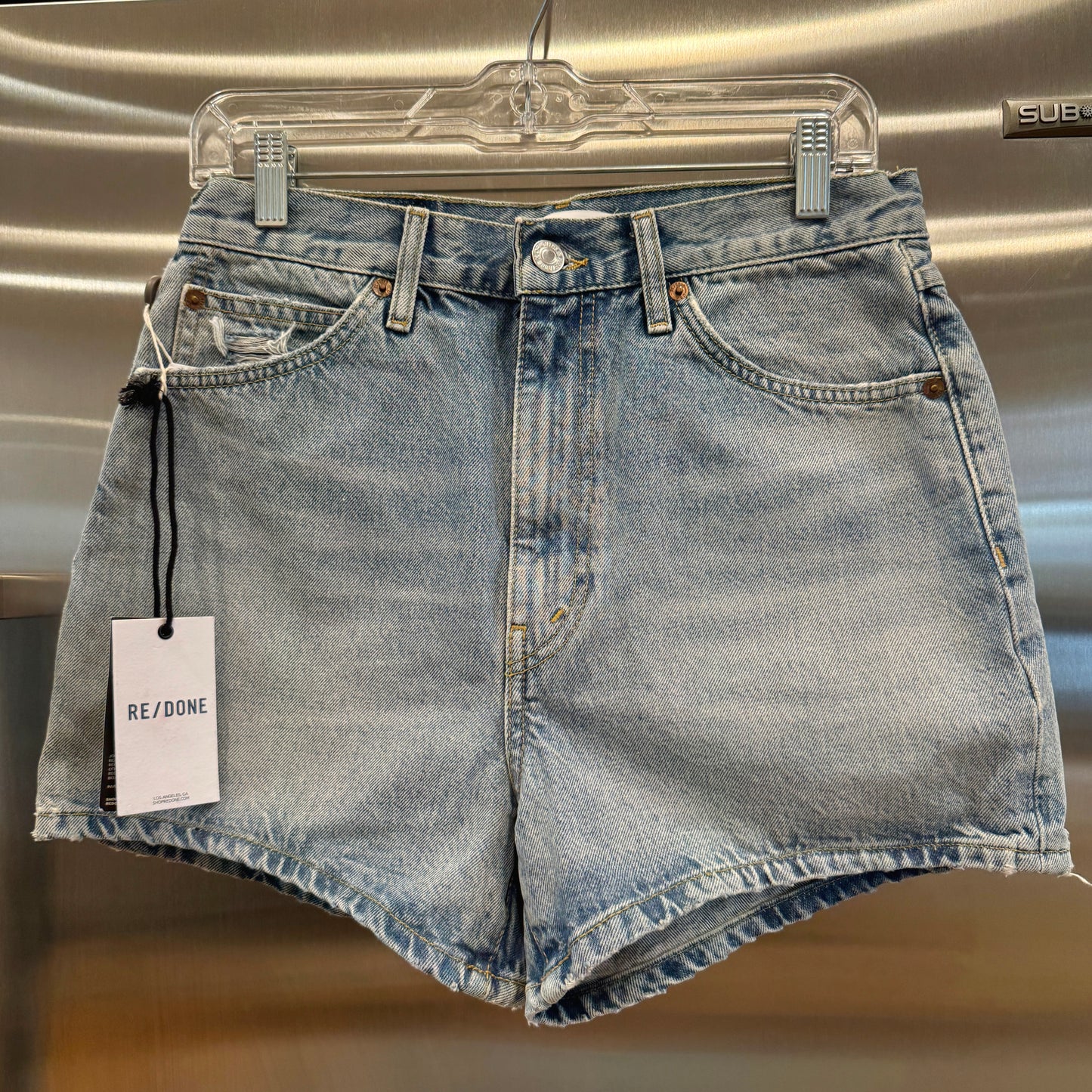 Re/Done Denim Shorts The Midi Short in Ripped Tide Light Wash