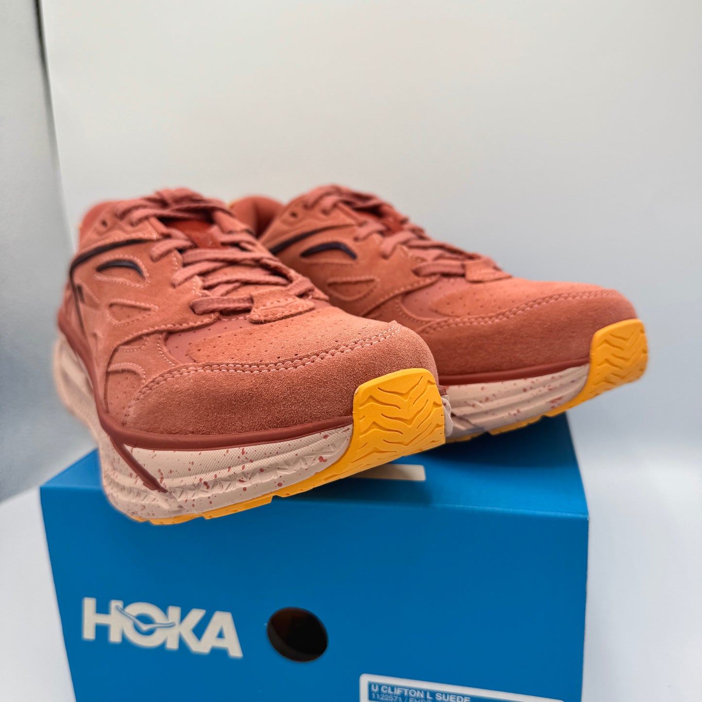 Hoka Clifton L Suede in Earthenware/ Hot Sauce Red Unisex Leather Sneakers
