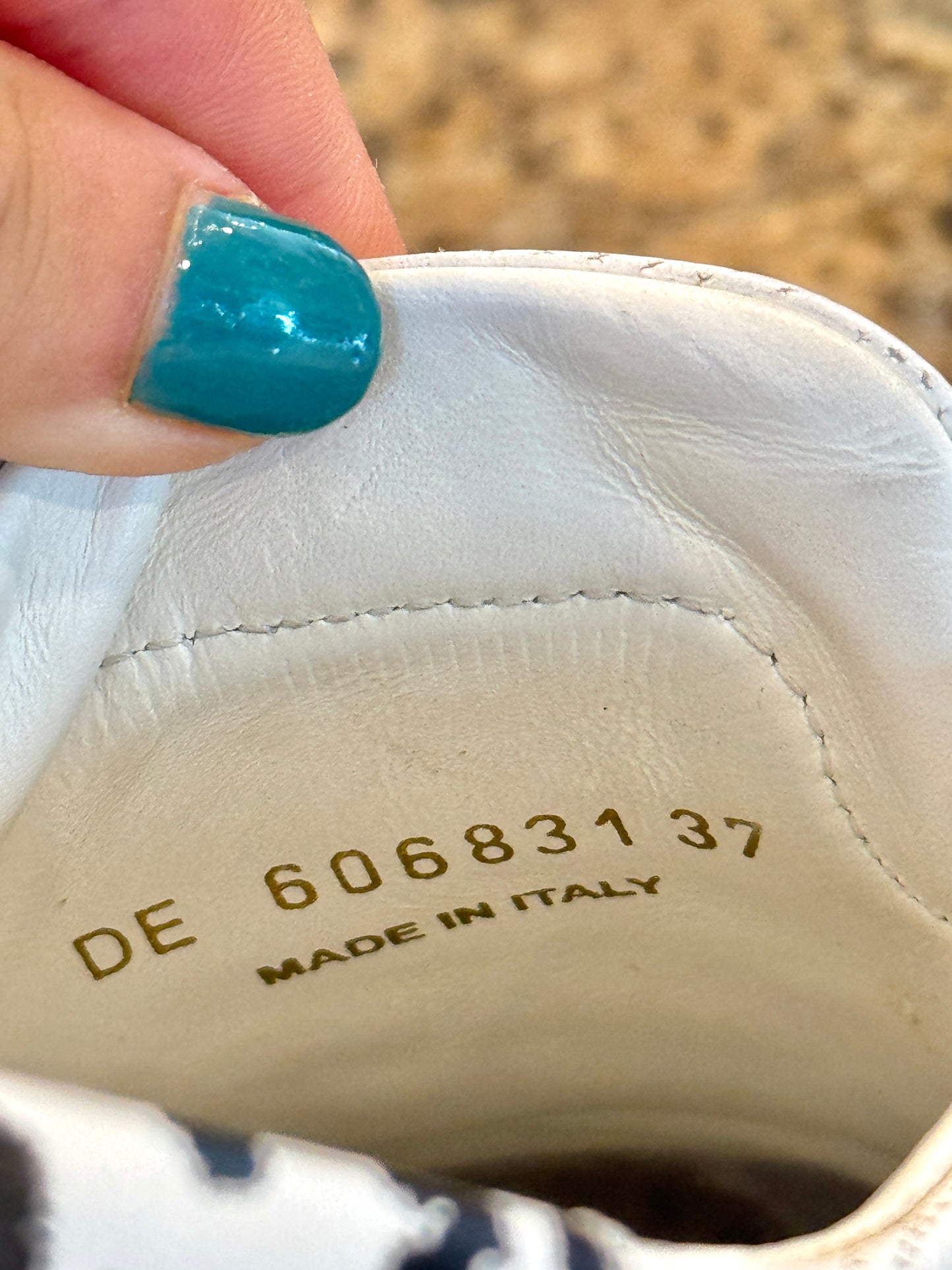 Saint Laurent Pre-Owned Perforated Andy leather sneakers in white with leopard trim
