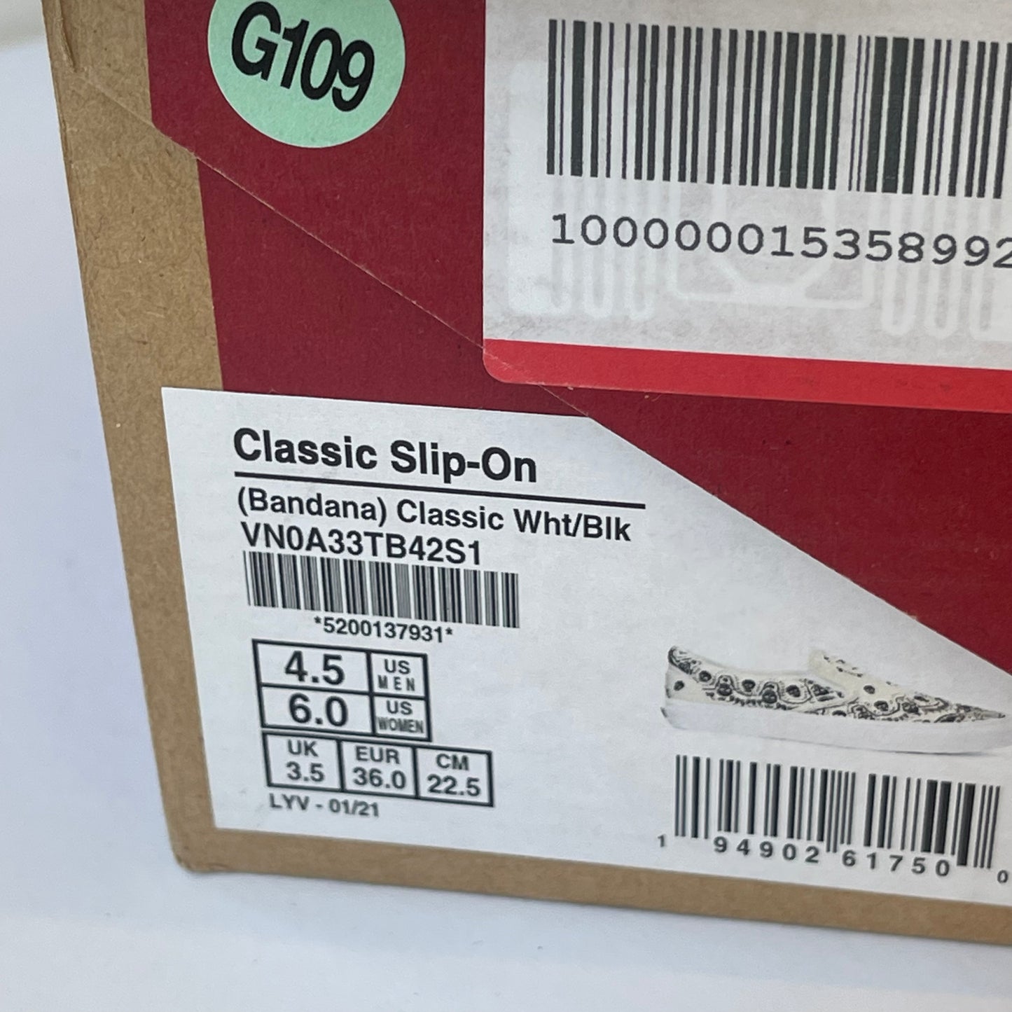 Vans Classic Slip On shoes in black / cream bandana skull skate sneaker