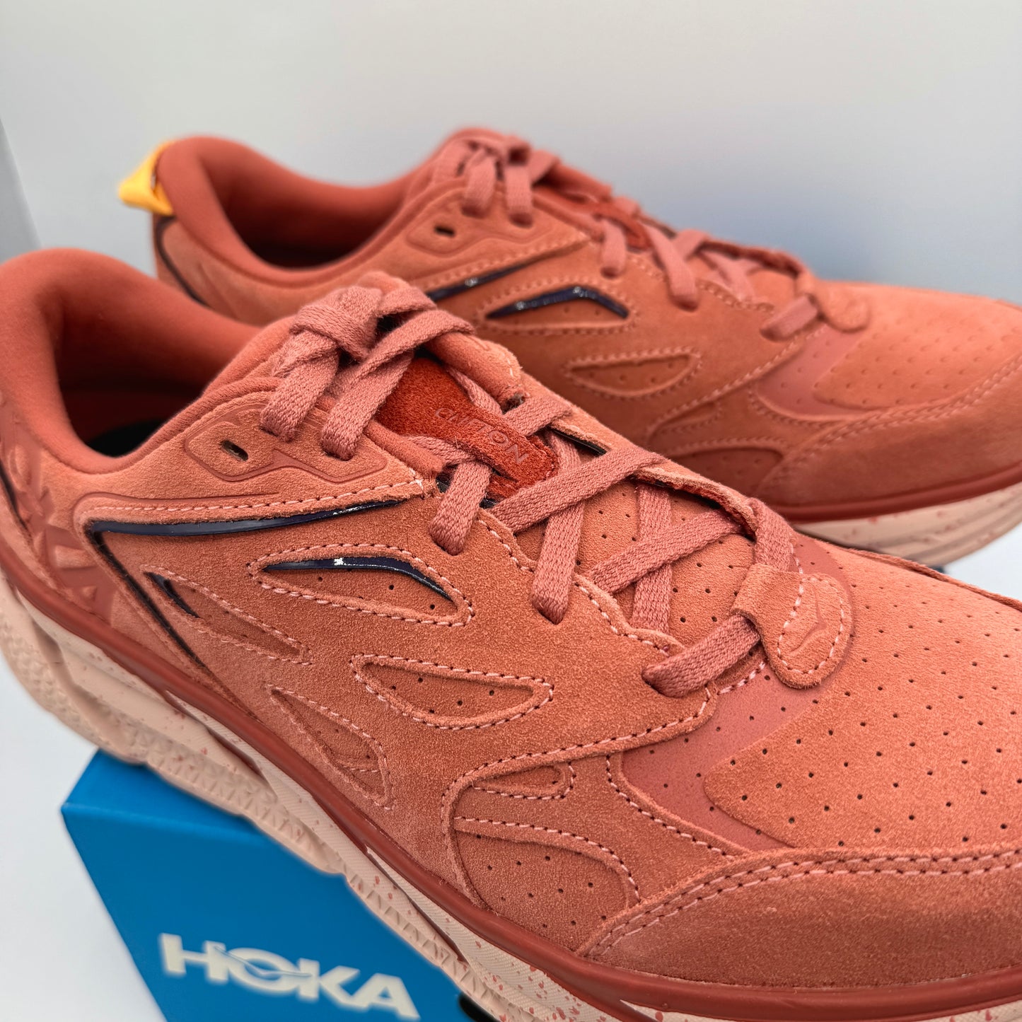 Hoka Clifton L Suede in Earthenware/ Hot Sauce Red Unisex Leather Sneakers