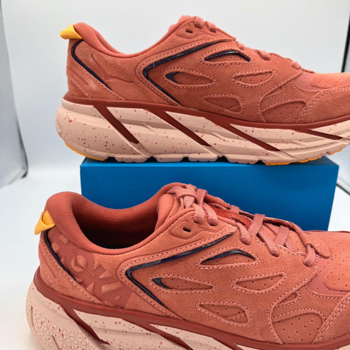 Hoka Clifton L Suede in Earthenware/ Hot Sauce Red Unisex Leather Sneakers