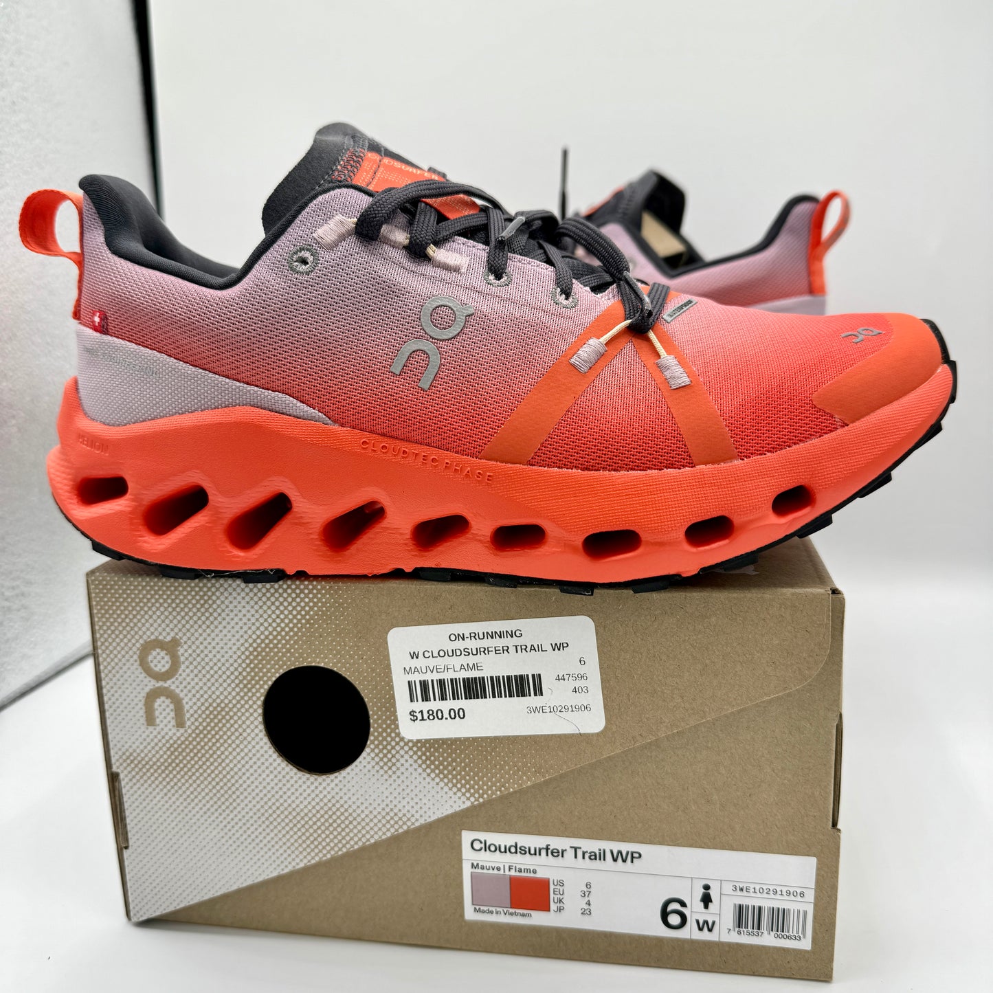 On Running Cloudsurfer Trail WP Waterproof Women’s Shoes Orange Grey Black