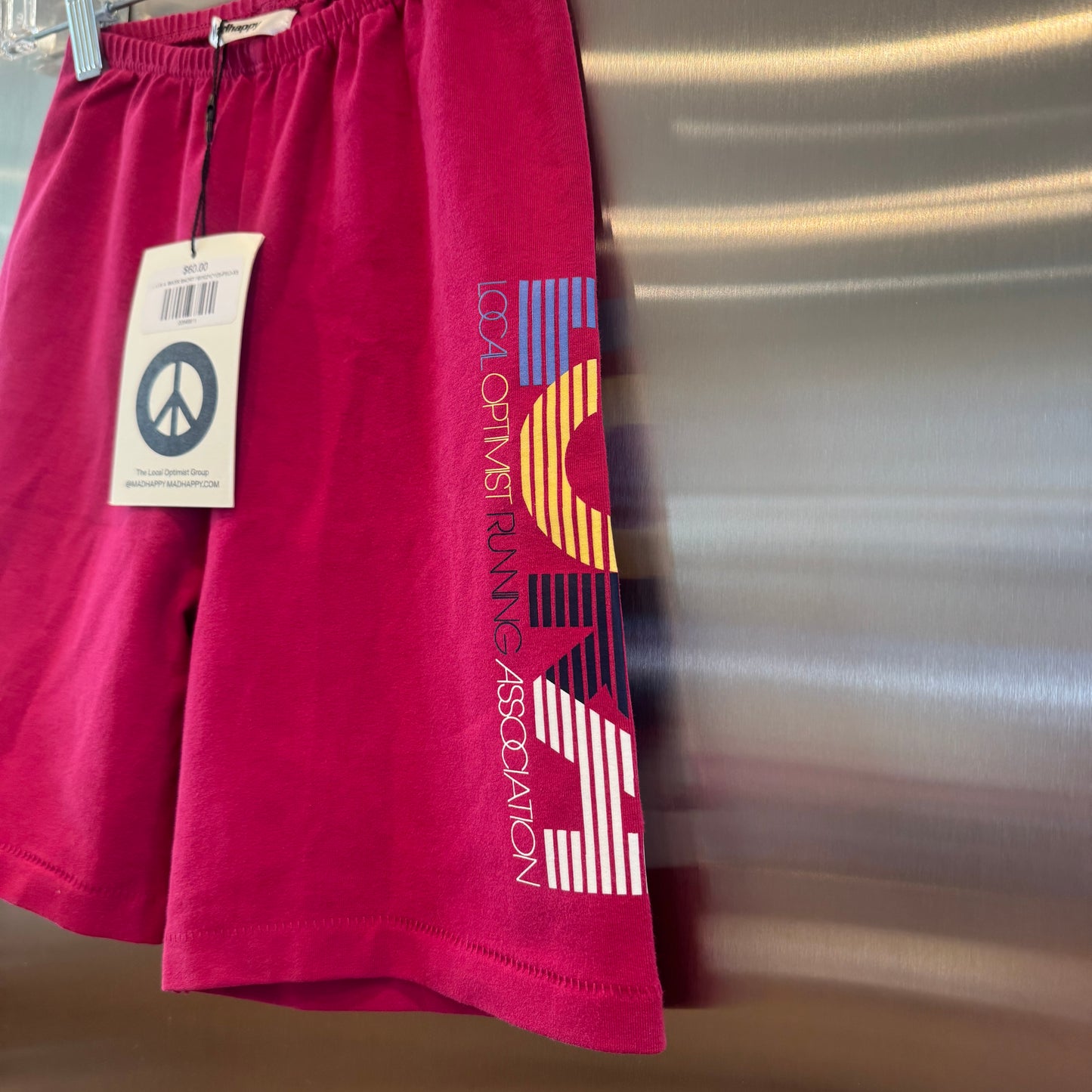 MadHappy Local Optimist Run Club Biker Shorts in Magenta Peony