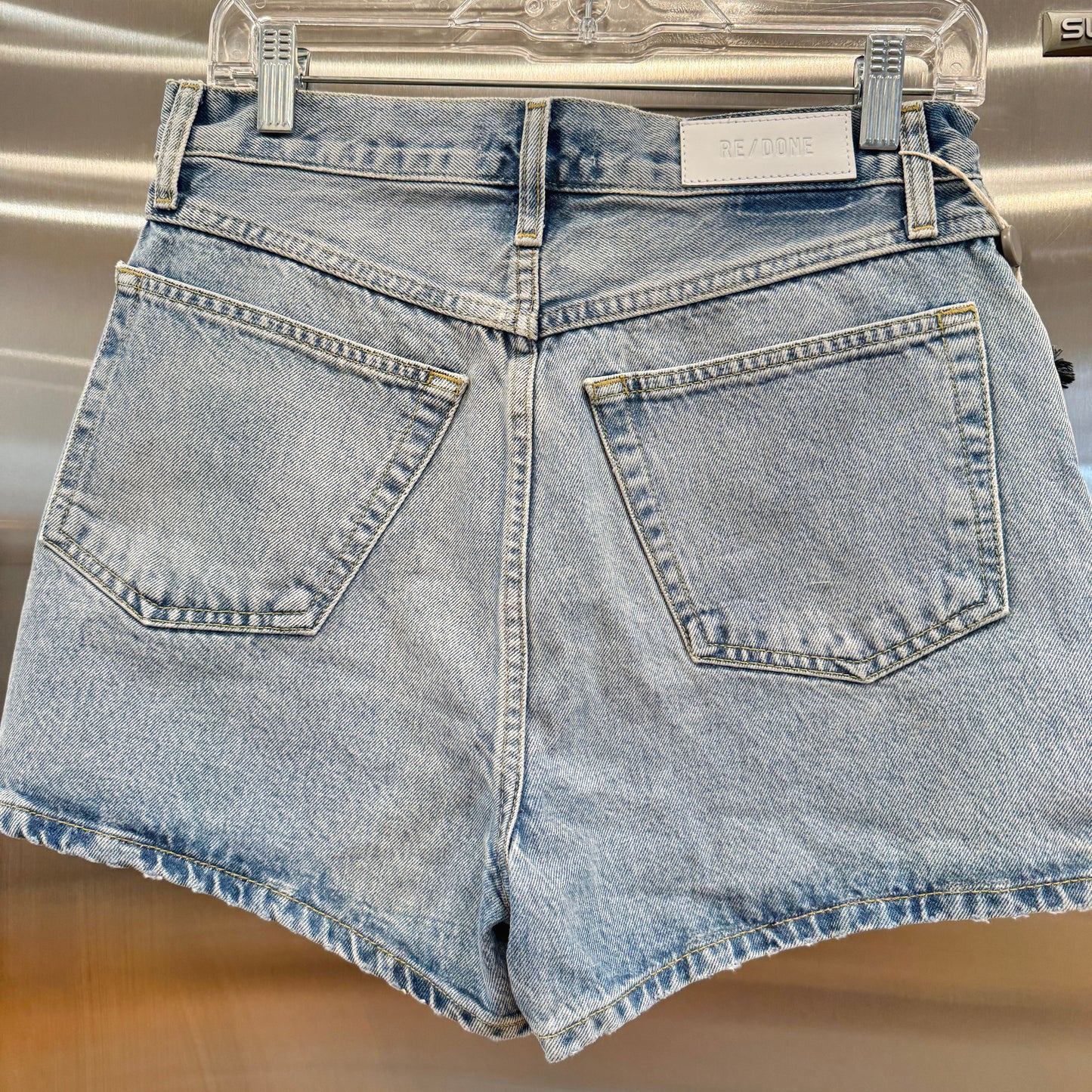 Re/Done Denim Shorts The Midi Short in Ripped Tide Light Wash