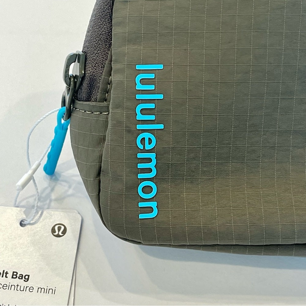 Lululemon Belt Bag Mini Carob Brown with Aqua Cyan Blue Mini Belt bag .7L Rare