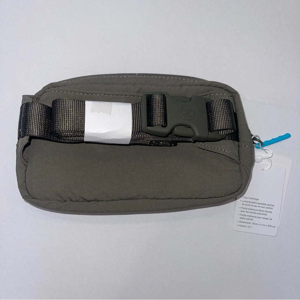 Lululemon Belt Bag Mini Carob Brown with Aqua Cyan Blue Mini Belt bag .7L Rare