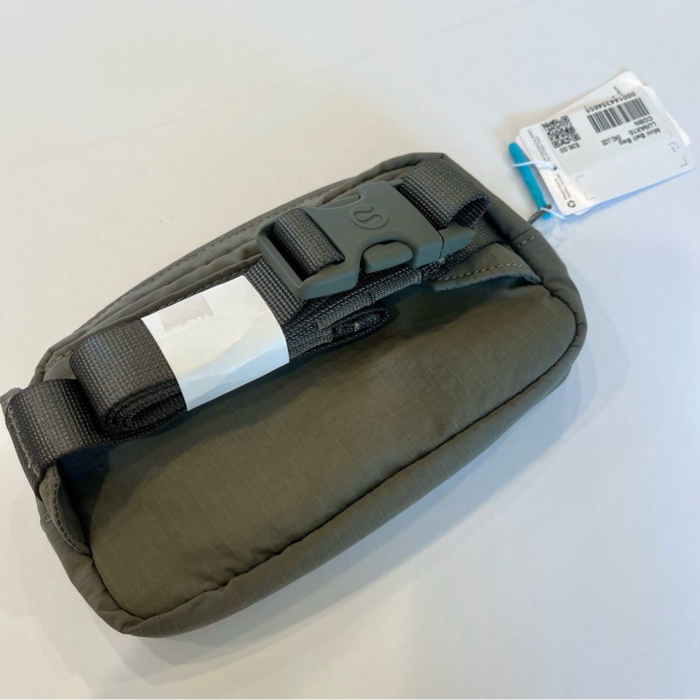 Lululemon Belt Bag Mini Carob Brown with Aqua Cyan Blue Mini Belt bag .7L Rare