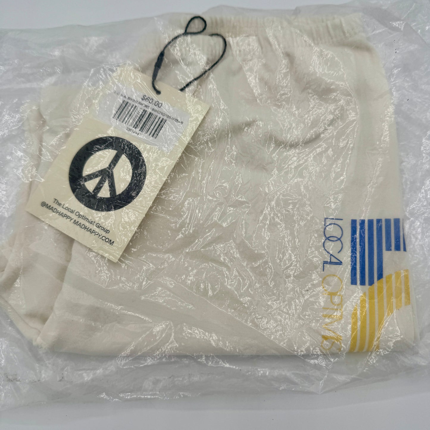 MadHappy Local Optimist Run Club Biker Shorts in Marshmallow / Cream