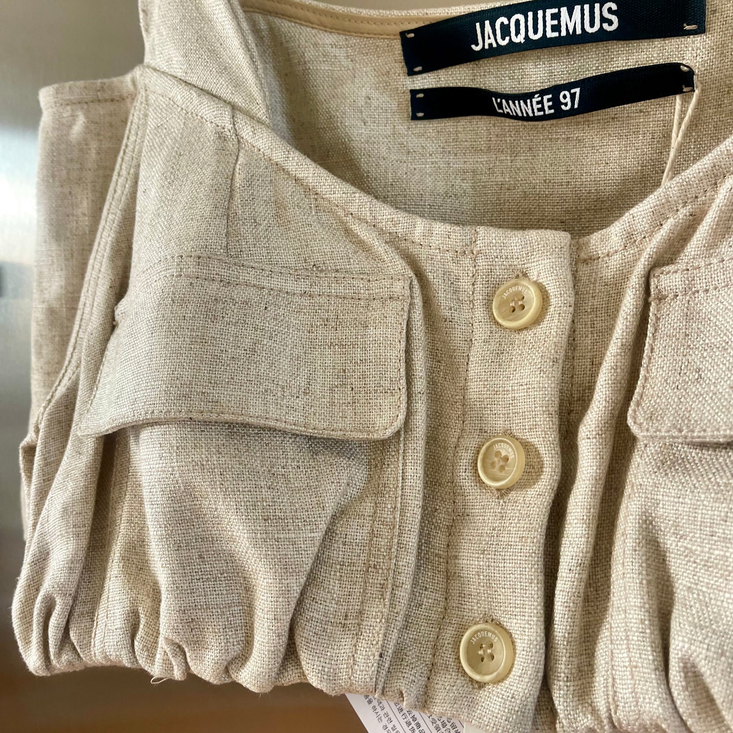 Jacquemus Le Haut Alzou Beige Linen Cropped Top Off shoulder pocket details