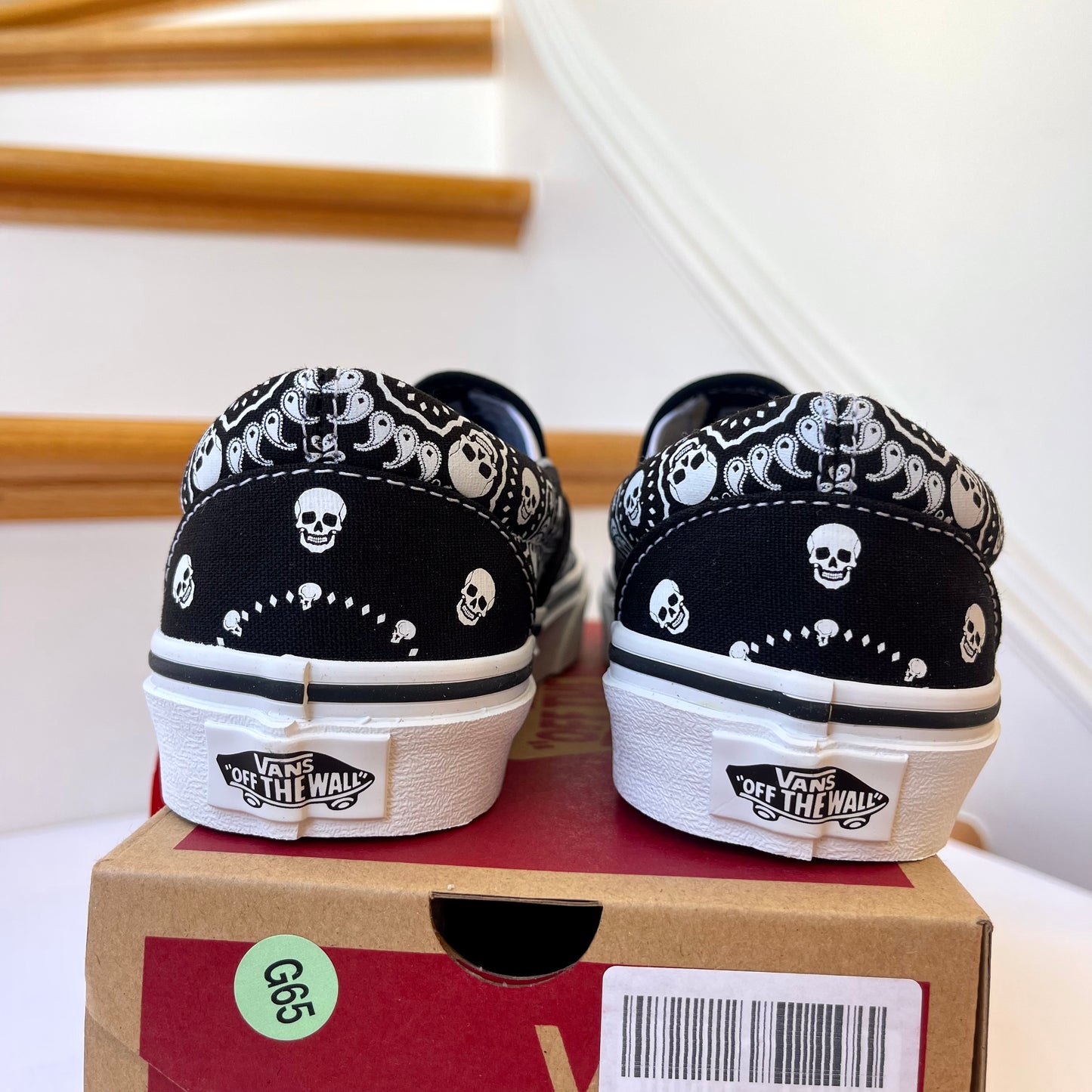 Vans Classic Slip On shoes in black / white bandana skull skate sneaker