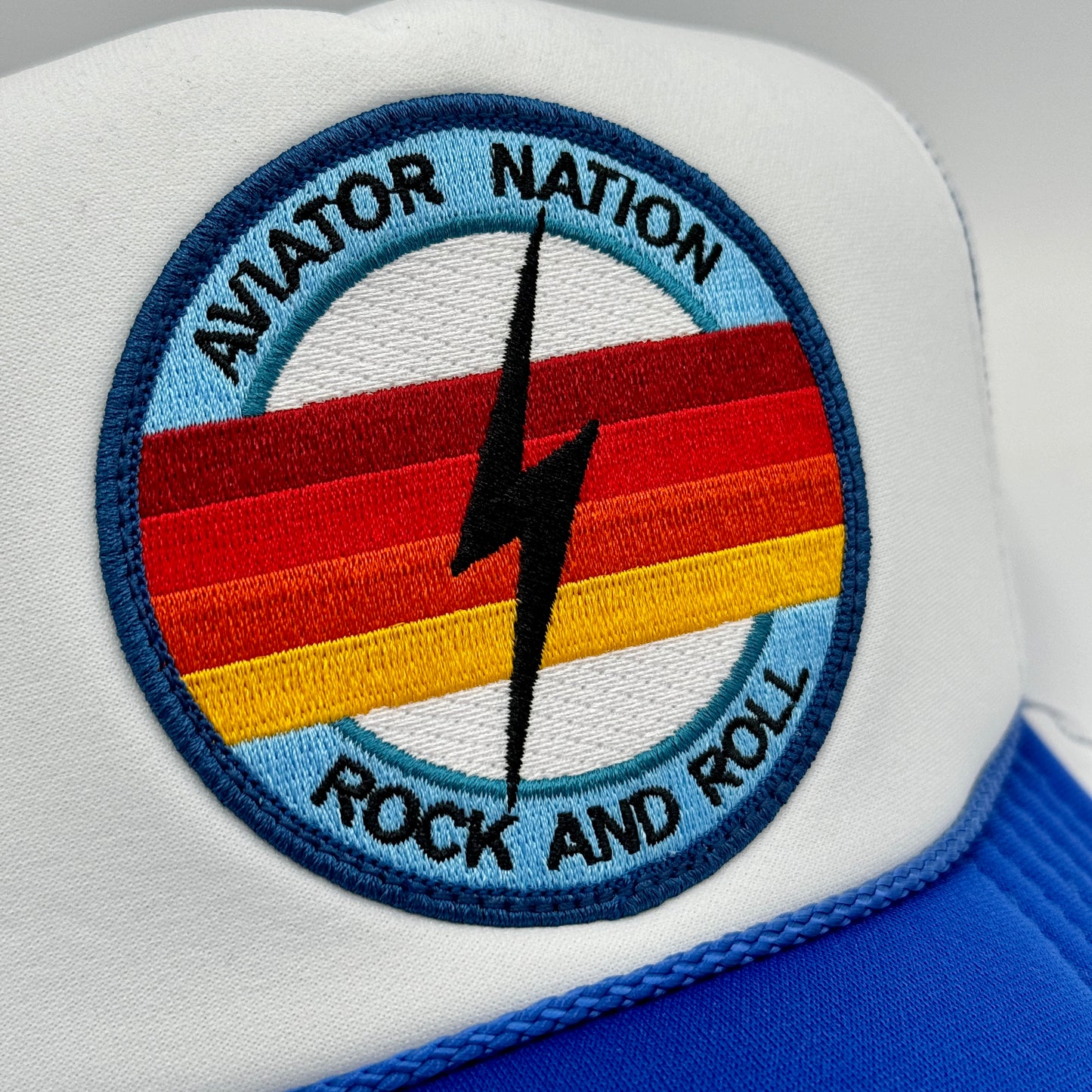 Aviator Nation Bolt Trucker Hat Royal Blue / White Rock and roll logo patch