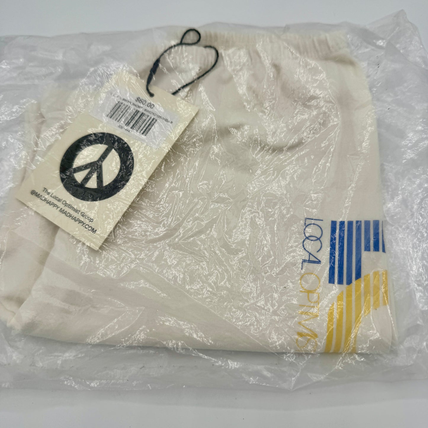 MadHappy Local Optimist Run Club Biker Shorts in Marshmallow / Cream