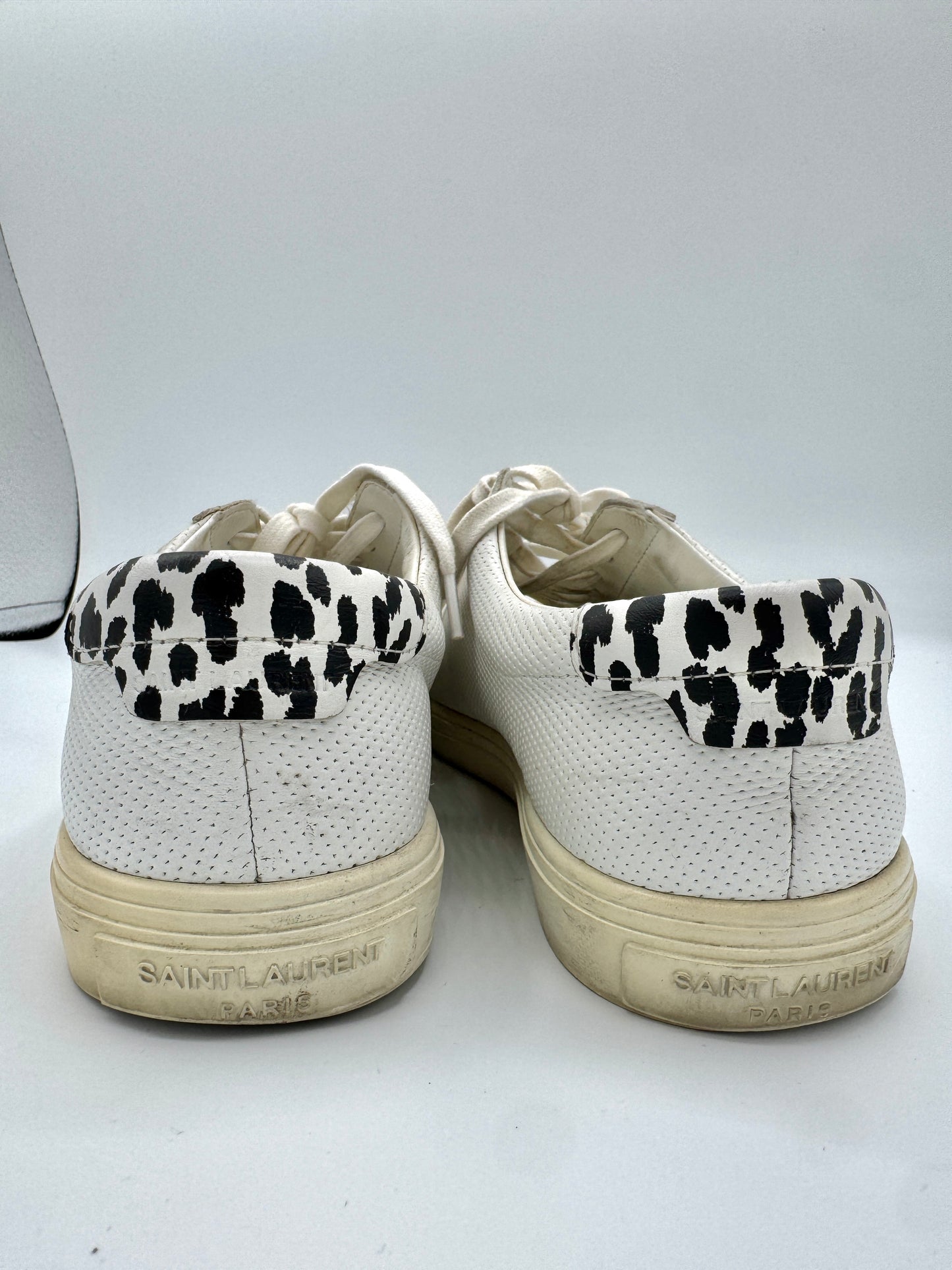 Saint Laurent Pre-Owned Perforated Andy leather sneakers in white with leopard trim