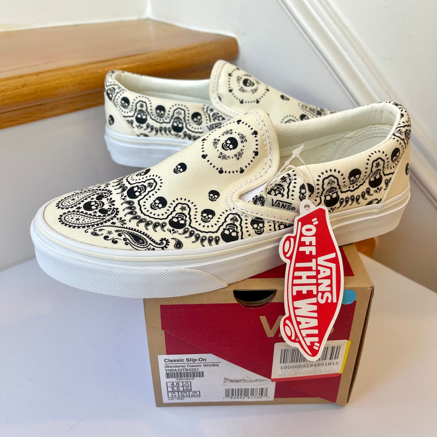 Vans Classic Slip On shoes in black / cream bandana skull skate sneaker