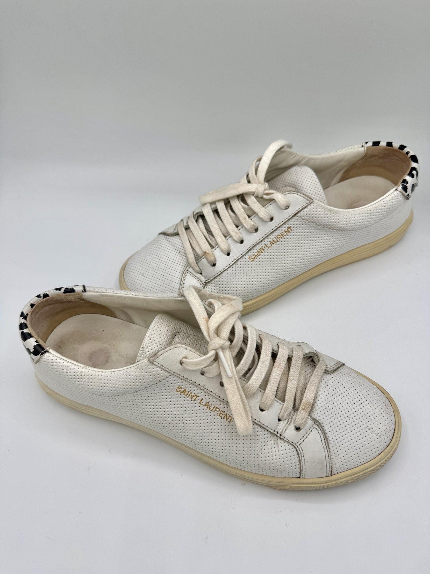 Saint Laurent Pre-Owned Perforated Andy leather sneakers in white with leopard trim