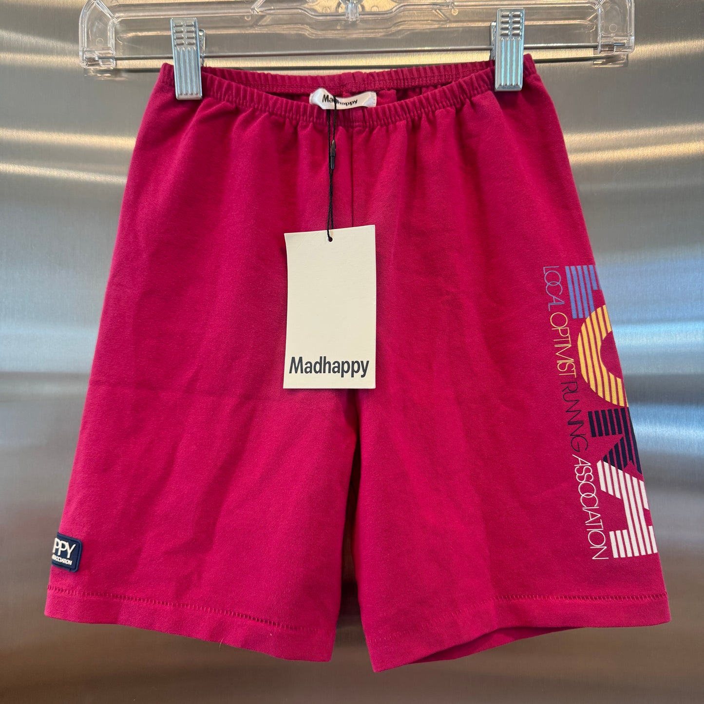 MadHappy Local Optimist Run Club Biker Shorts in Magenta Peony
