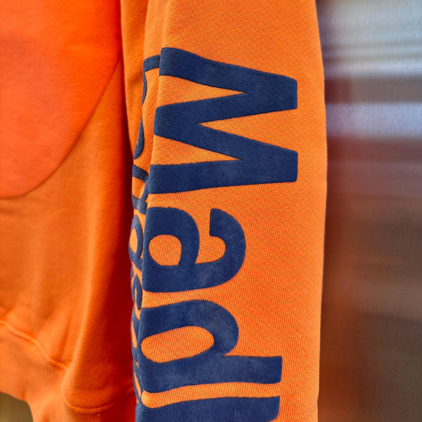 MadHappy Headspace Heritage Universal Crewneck Sweatshirt in Orange with navy raised logo