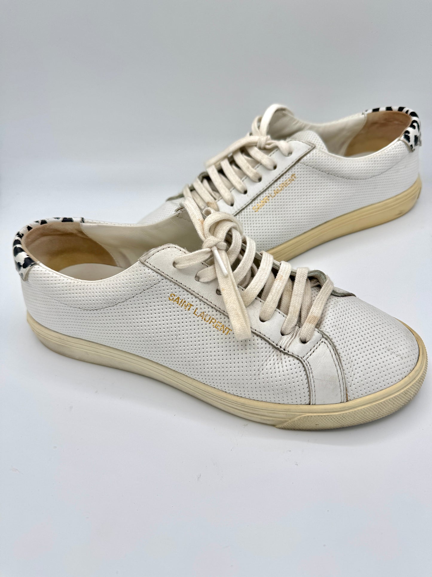 Saint Laurent Pre-Owned Perforated Andy leather sneakers in white with leopard trim