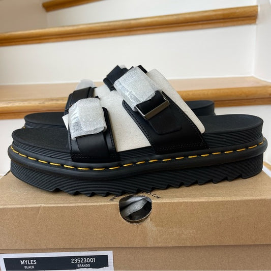 Dr. Martens Myles Brando Leather Slide Sandals in black buckles platforms