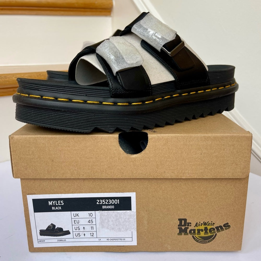 Dr. Martens Myles Brando Leather Slide Sandals in black buckles platforms