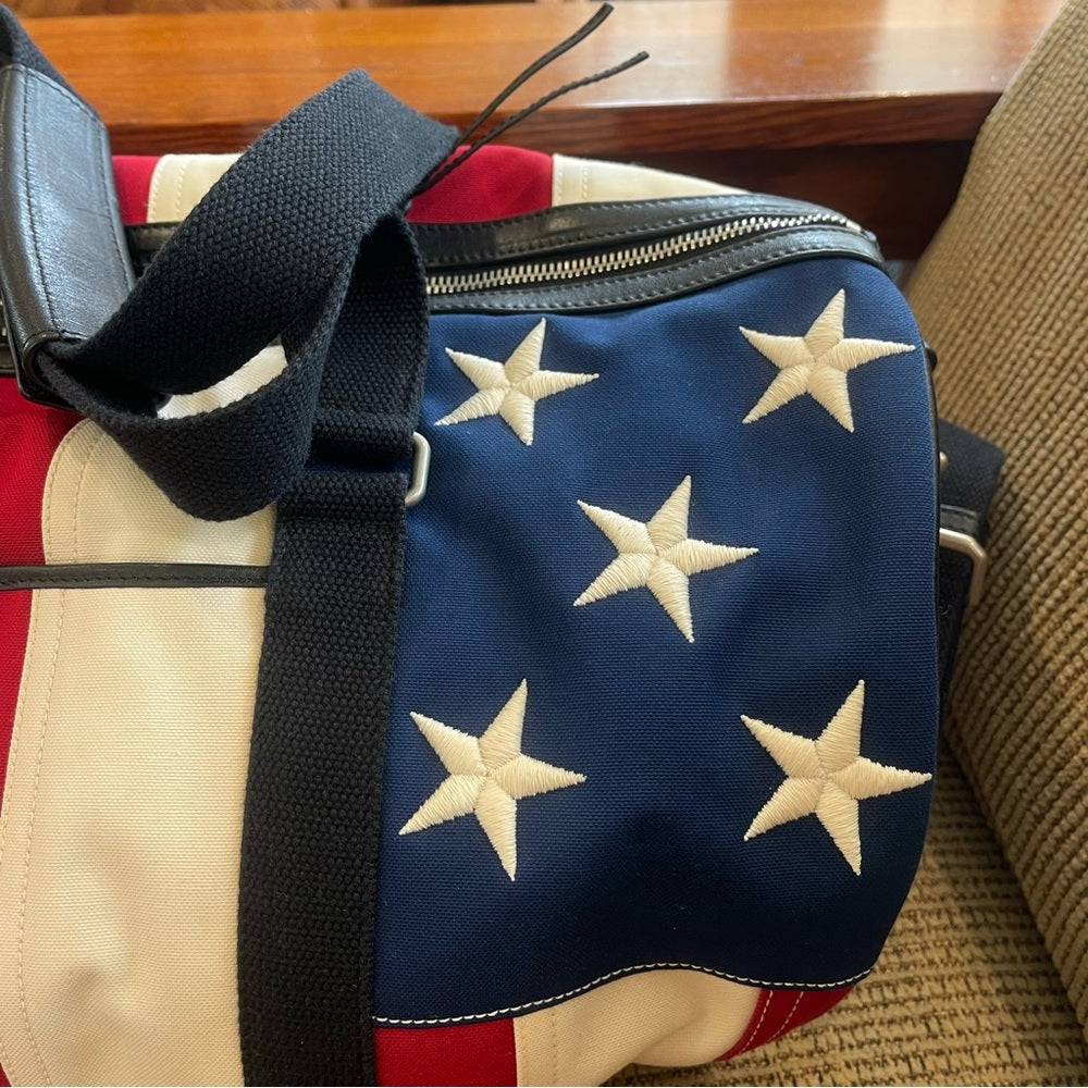 Yves Saint Laurent Noe Duffle Gym Bag in red white and blue stars / stripes