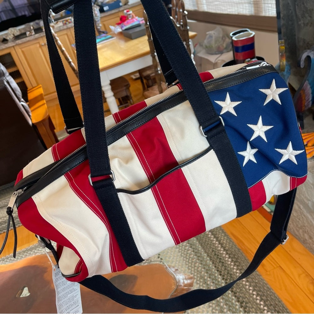 Yves Saint Laurent Noe Duffle Gym Bag in red white and blue stars / stripes