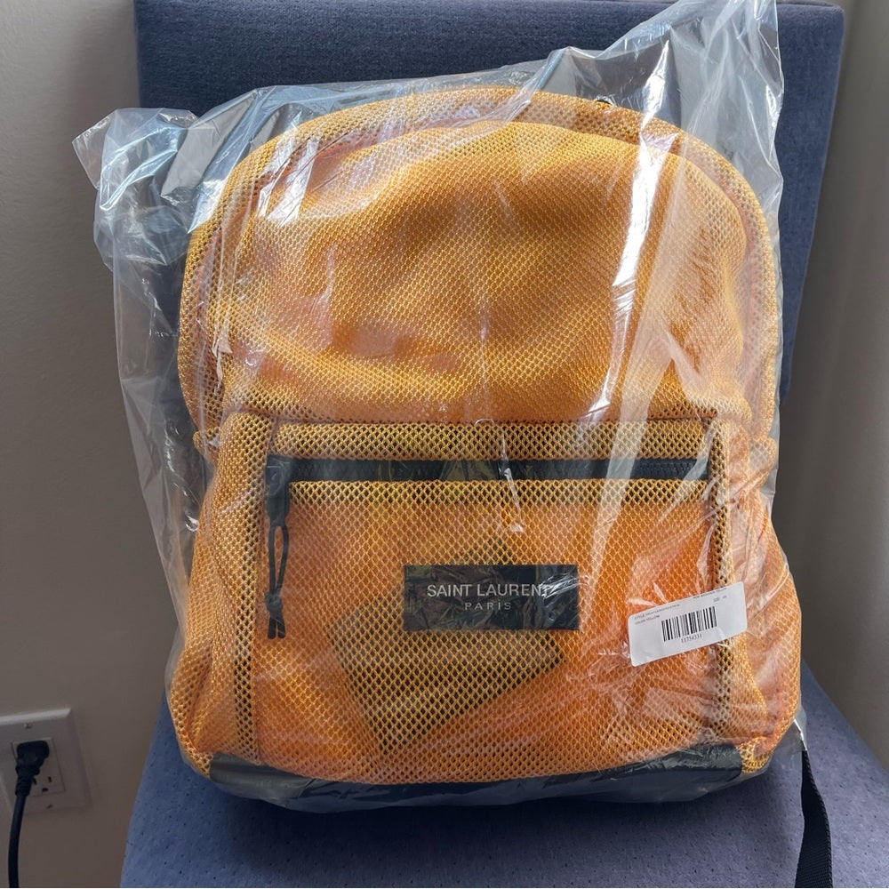 Yves Saint Laurent Yellow backpack mesh with black trim / straps - brand new